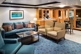 The Suite Life. Living room and dining room in the Owner's suite on Allure of the Seas