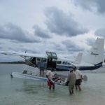 Transporting my husband on a stretcher into the seaplane for evacuation for Coco Cay