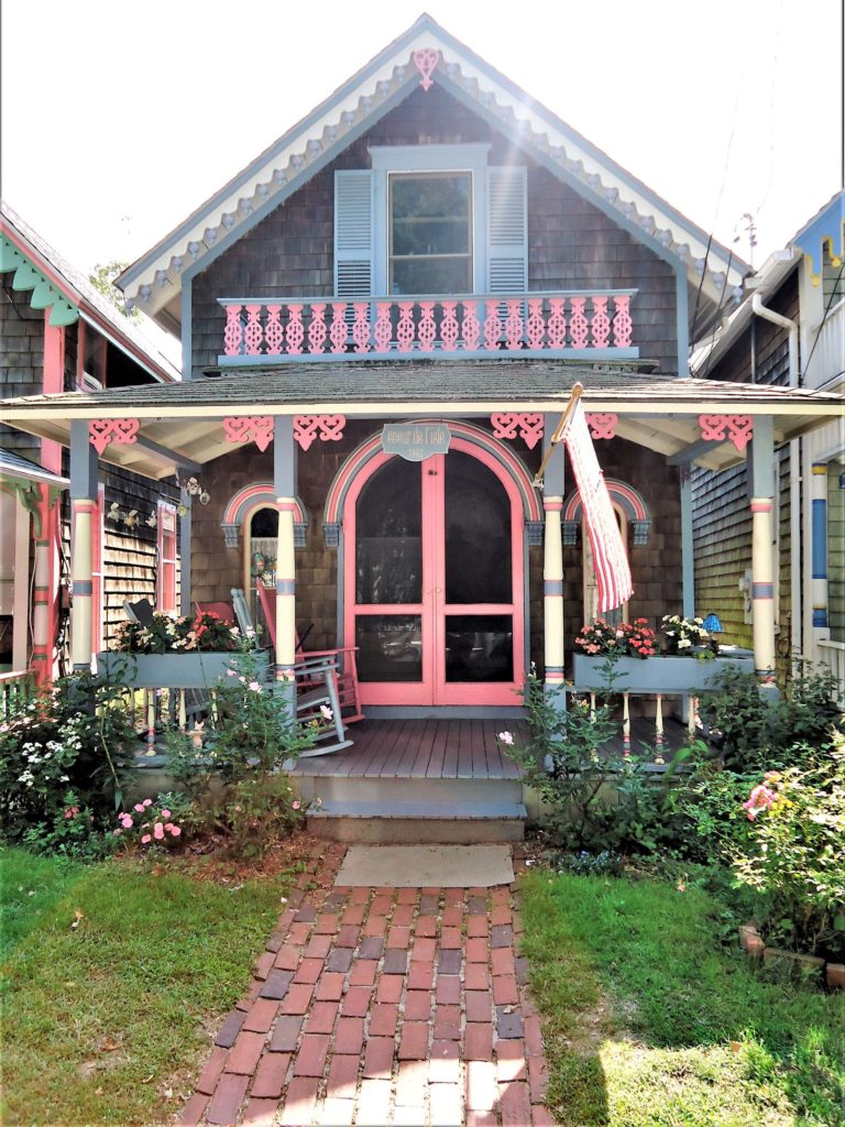 pink grey gingerbread cottage